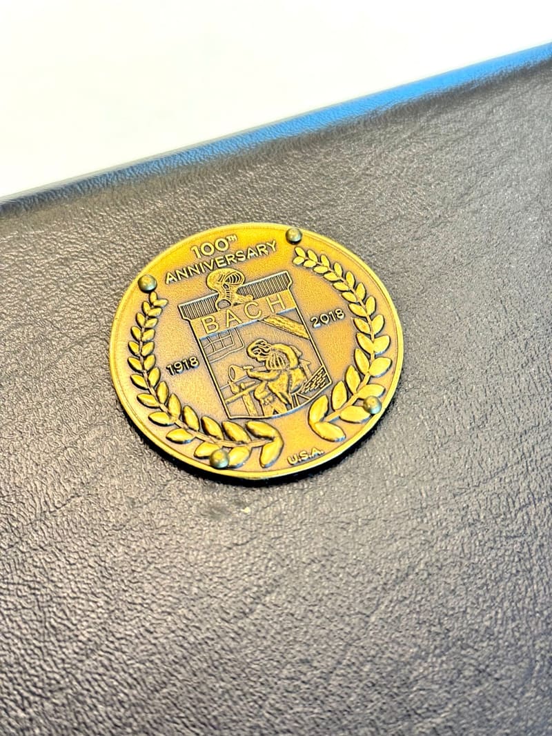 Bach 100th anniversary commemorative medallion on the wood-shell trumpet case